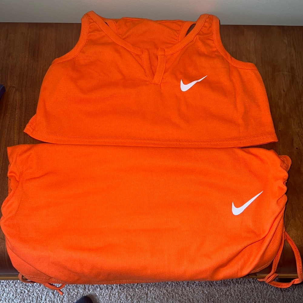 Nike branded crop shirt and ruched skirt set